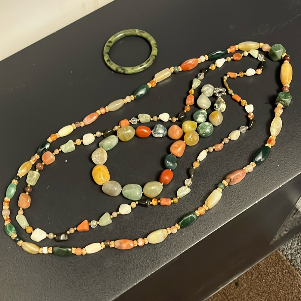 Real quartz necklaces (x3) and one quartz bracelet in jade . New